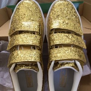 Woman’s size 6 gold glitter Puma sneakers